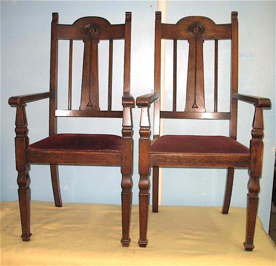 A pair of oak Art Nouveau elbow chairs